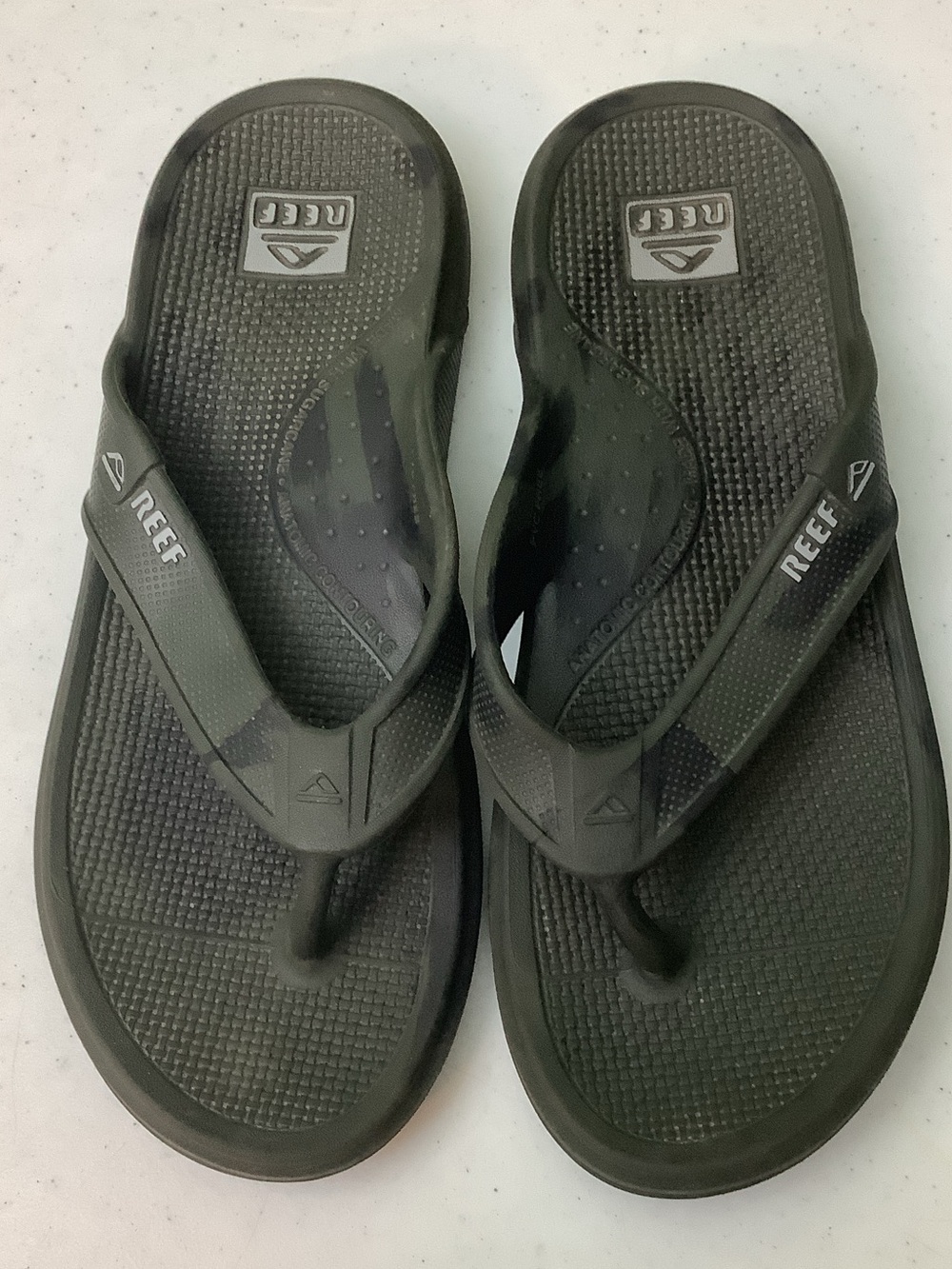 Reef camouflage flip flops, size 12